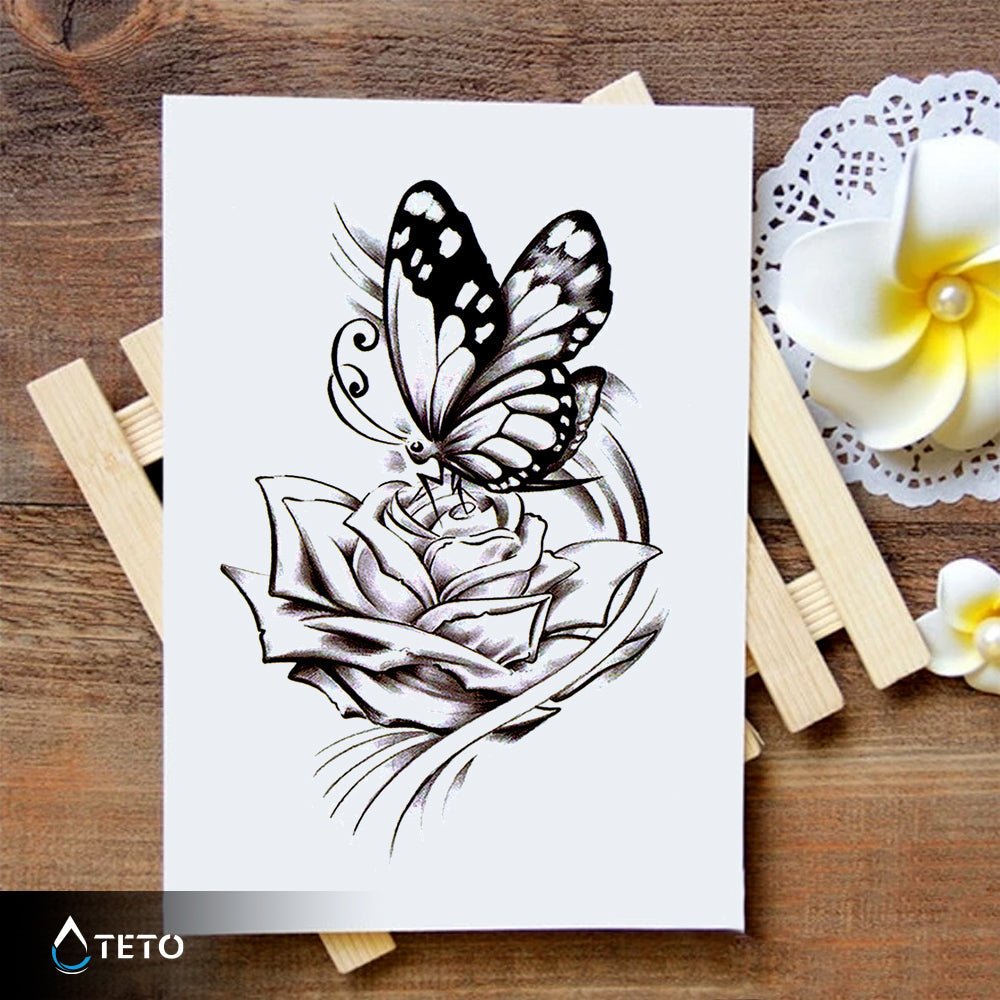 Mariposa sobre una rosa - TETO - Tatuajes Temporales