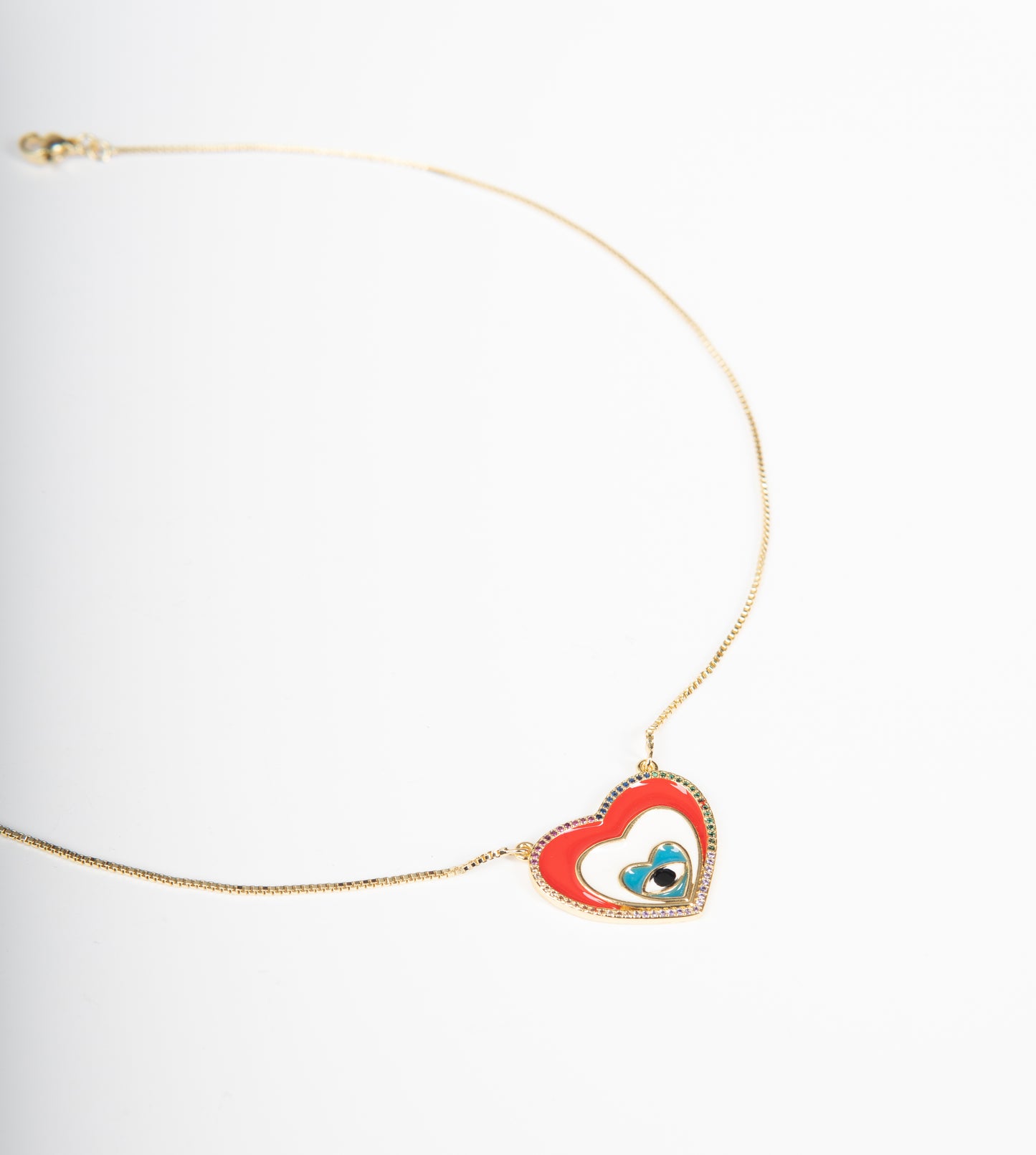Collar con corazon y ojo turco