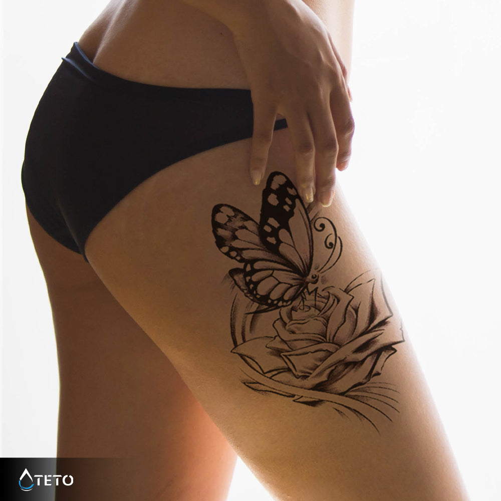 Mariposa sobre una rosa - TETO - Tatuajes Temporales