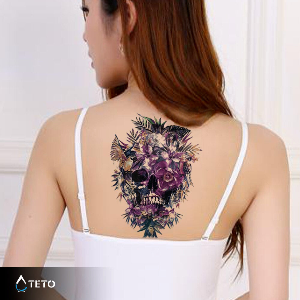 Calavera con flores rosadas - TETO - Tatuajes Temporales