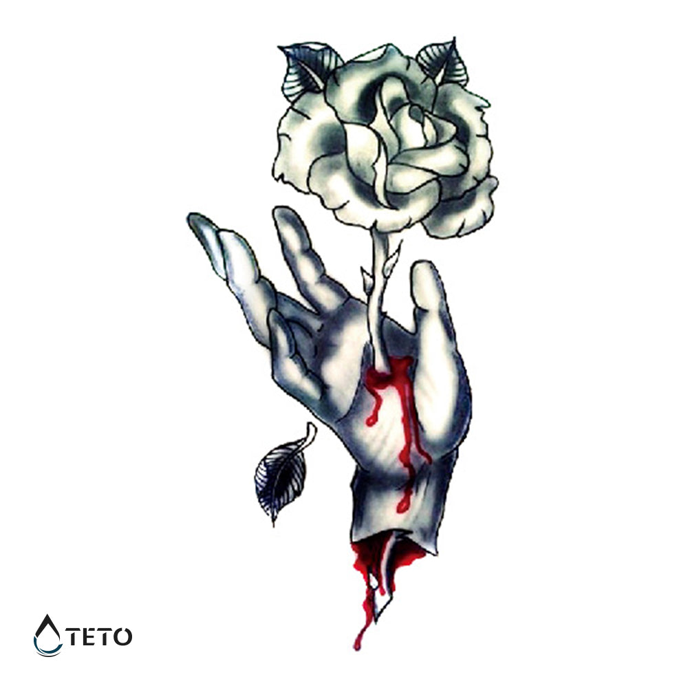 Rosa en mano - TETO - Tatuajes Temporales